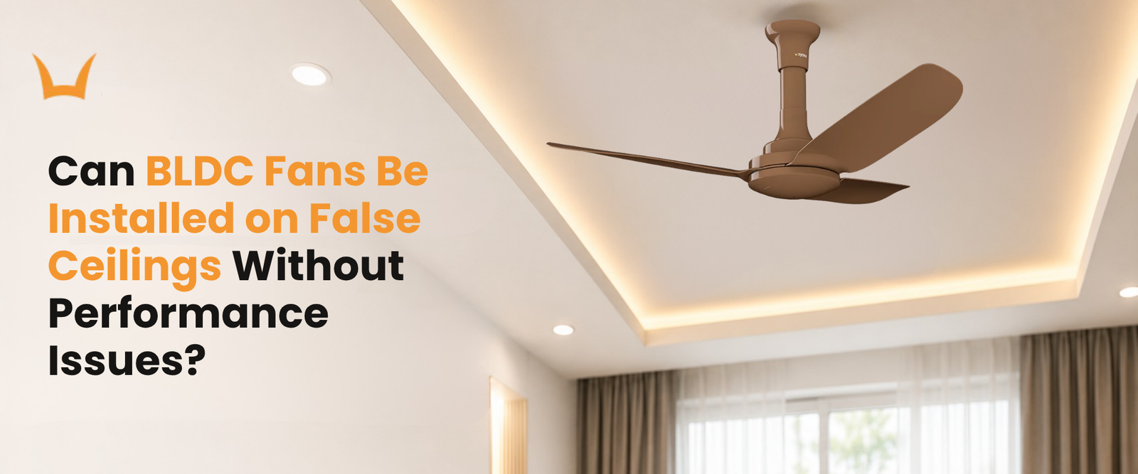 BLDC ceiling fan mounted on a false ceiling with ambient lighting in a modern room.