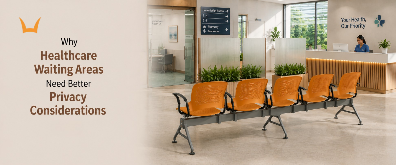 Orange waiting chairs with privacy dividers in hospital lobby